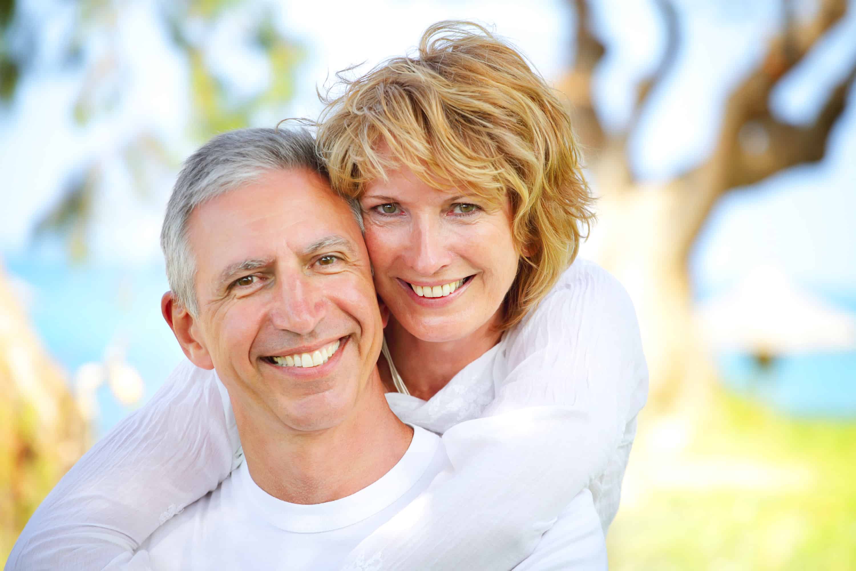 implants vs dentures pros and cons