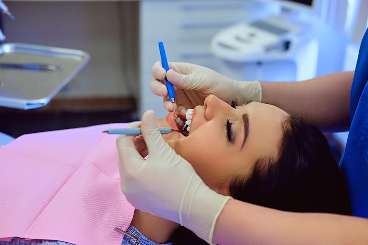 Why dental bonding helps with tooth discoloration